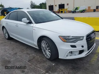 2014 Audi A6 Prestige with VIN WAUHGAFC1EN037698, listed as a IAAI auction lot 42605685 with 128,051 mi miles and . Bid and sale history available at DreamBid. Image 1.