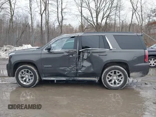 2019 GMC Yukon SLE with VIN 1GKS2AKC1KR385085, listed as a IAAI auction lot 41699370 with 83,889 mi miles. Bid and sale history available at carsss.com. Image 14.