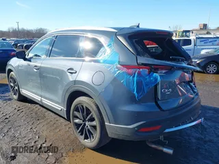 2021 Mazda CX-9 Grand Touring with VIN JM3TCBDY5M0506632, listed as a IAAI auction lot 41589264 with 50,026 mi miles and . Bid and sale history available at carsss.com. Image 18.