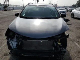 2016 Toyota RAV4 SE with VIN 2T3JFREV9GW453907, listed as a Copart auction lot 60438385 with 59,288 mi miles and Salvage title. Bid and sale history available at DreamBid. Image 5.