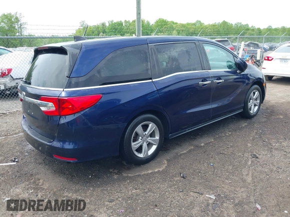 2019 Honda Odyssey EX with VIN 5FNRL6H50KB018150, listed as a IAAI auction lot 42119727 with 94,535 mi miles. Bid and sale history available at carsss.com. Image 4.