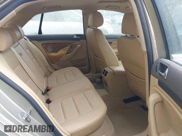 2006 Volkswagen Jetta 2.5L z VIN 3VWSF71K76M750076, wystawiony jako IAAI lot #42769137 z przebiegiem 99 114 mil mil oraz . Historia ofert i sprzedaży dostępna na DreamBid. Obrazek 8.