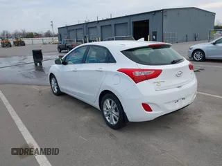 2013 Hyundai Elantra GT with VIN KMHD35LE1DU145894, listed as a IAAI auction lot 41828751 with 90,529 mi miles. Bid and sale history available at carsss.com. Image 3.