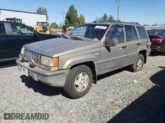 1995 Jeep Grand Cherokee Laredo with VIN 1J4FX58S1SC754691, listed as a Copart auction lot 72858214 with 251,234 mi miles and Salvage Title. Bid and sale history available at carsss.com. Image 1.