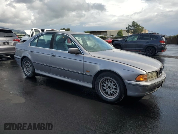1999 BMW 5 Series 528iA with VIN WBADM6332XBY20123, listed as a Copart auction lot 50585535 with 171,928 mi miles and Clean Title. Bid and sale history available at carsss.com. Image 4.
