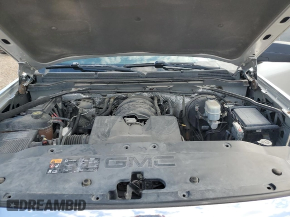2014 GMC Sierra 1500 z VIN 1GTN1TEH2EZ270594, wystawiony jako Copart lot #76334054 z przebiegiem 102 997 mil mil oraz Szkody całkowita. Historia ofert i sprzedaży dostępna na DreamBid. Obrazek 11.
