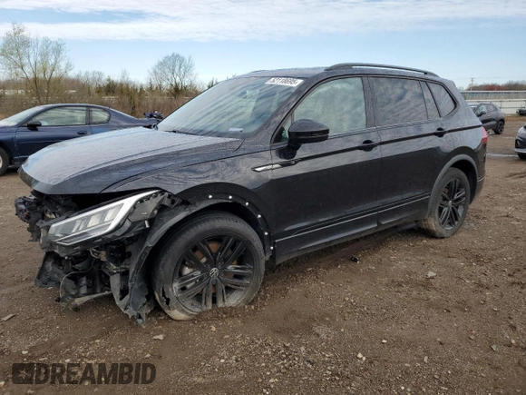 2022 Volkswagen Tiguan SE R-Line Black z VIN 3VV8B7AX9NM088599, wystawiony jako Copart lot #52118695 z przebiegiem 27 836 mil mil oraz Szkody całkowita. Historia ofert i sprzedaży dostępna na DreamBid. Obrazek 1.
