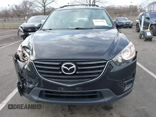 2016 Mazda CX-5 Sport with VIN JM3KE4BY7G0893578, listed as a IAAI auction lot 41853840 with 95,937 mi miles. Bid and sale history available at carsss.com. Image 12.