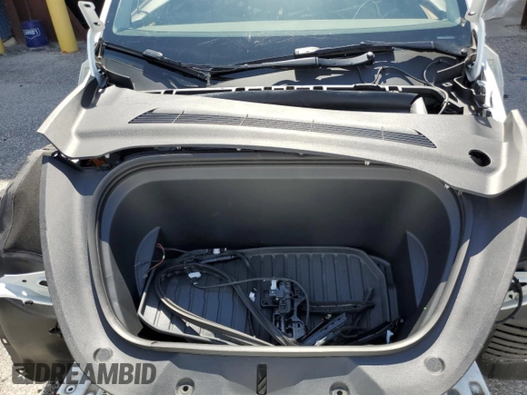 2024 Tesla Model Y Long Range with VIN 7SAYGDEEXRA288960, listed as a Copart auction lot 60801525 with 18,942 mi miles and Salvage title. Bid and sale history available at DreamBid. Image 12.
