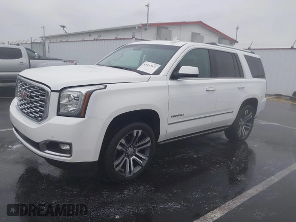 2018 GMC Yukon Denali with VIN 1GKS2CKJ8JR274087, listed as a IAAI auction lot 41097872 with 76,828 mi miles. Bid and sale history available at carsss.com. Image 19.