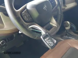 2023 Ford Bronco z VIN 1FMEE5DP8PLA91454, wystawiony jako IAAI lot #42023594 z przebiegiem 49 354 mil mil oraz . Historia ofert i sprzedaży dostępna na DreamBid. Obrazek 11.