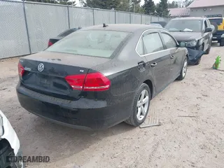 2012 Volkswagen Passat SE w/Sunroof with VIN 1VWBH7A32CC075642, listed as a IAAI auction lot 41800570 with 187,180 mi miles. Bid and sale history available at carsss.com. Image 4.