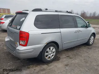 2008 Hyundai Entourage GLS with VIN KNDMC233886056576, listed as a IAAI auction lot 42060756 with 114,121 mi miles. Bid and sale history available at carsss.com. Image 4.