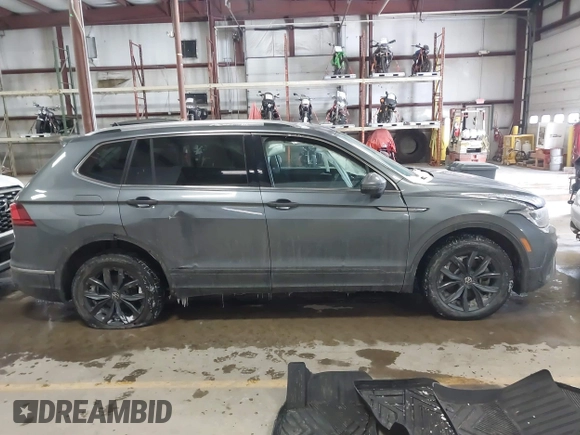 2023 Volkswagen Tiguan SE with VIN 3VVMB7AX5PM013447, listed as a IAAI auction lot 41615200 with 66,259 mi miles and . Bid and sale history available at DreamBid. Image 13.