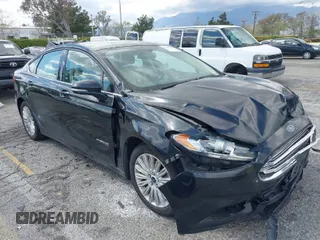 2015 Ford Fusion SE Hybrid with VIN 3FA6P0LU7FR199065, listed as a IAAI auction lot 41944181 with 197,020 mi miles. Bid and sale history available at carsss.com. Image 1.