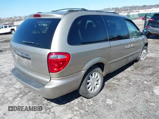 2002 Chrysler Town & Country EX with VIN 2C8GP74LX2R573857, listed as a IAAI auction lot 41846302 with Not Provided miles and . Bid and sale history available at carsss.com. Image 4.