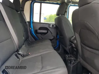 2021 Jeep Gladiator Freedom с VIN 1C6HJTAG7ML553303, выставлен на аукционе Copart как лот 57038585 с пробегом 49 400 миль миль и Списание • Salvage title. История ставок и продаж доступна на DreamBid. Изображение 10.