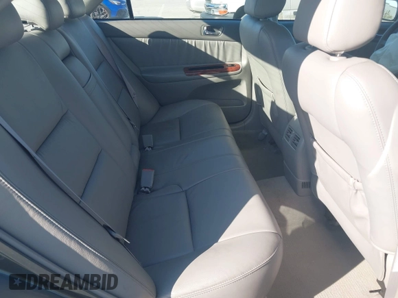 2005 Toyota Camry LE with VIN 4T1BF30K55U619313, listed as a IAAI auction lot 41854001 with 89,982 mi miles and . Bid and sale history available at DreamBid. Image 8.