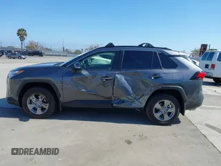 2024 Toyota RAV4 Hybrid LE with VIN JTMMWRFV0RD248035, listed as a IAAI auction lot 42339244 with 18,317 mi miles and . Bid and sale history available at DreamBid. Image 14.