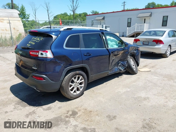 2016 Jeep Cherokee Latitude with VIN 1C4PJMCS5GW209340, listed as a IAAI auction lot 42401705 with 141,994 mi miles and . Bid and sale history available at DreamBid. Image 4.