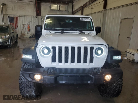 2021 Jeep Wrangler Unlimited Sport S z VIN 1C4HJXDG6MW777009, wystawiony jako Copart lot #60307665 z przebiegiem 30 634 mil mil oraz Szkoda całkowita • Salvage title. Historia ofert i sprzedaży dostępna na DreamBid. Obrazek 5.
