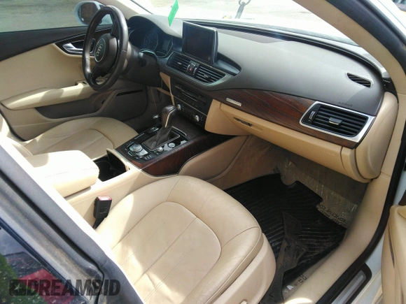 2016 Audi A7 3.0 Premium Plus with VIN WAUWGAFC6GN144188, listed as a IAAI auction lot 41824927 with 128,379 mi miles. Bid and sale history available at carsss.com. Image 5.