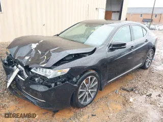 2015 Acura TLX V6 Tech with VIN 19UUB2F50FA016665, listed as a IAAI auction lot 41563642 with 161,386 mi miles. Bid and sale history available at carsss.com. Image 2.