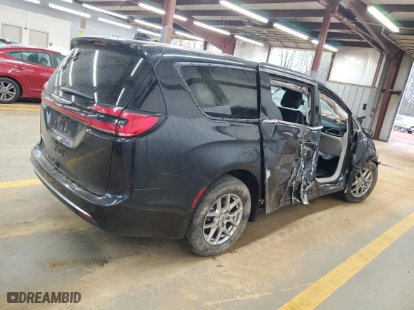 2023 Chrysler Pacifica Touring L with VIN 2C4RC1BG3PR582271, listed as a Copart auction lot 51644595 with 57,930 mi miles and Salvage Title. Bid and sale history available at carsss.com. Image 3.