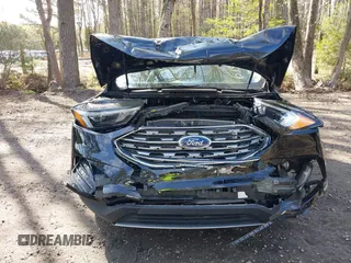 2022 Ford Edge Titanium with VIN 2FMPK4K95NBB06151, listed as a IAAI auction lot 41932545 with 57,762 mi miles and . Bid and sale history available at DreamBid. Image 12.