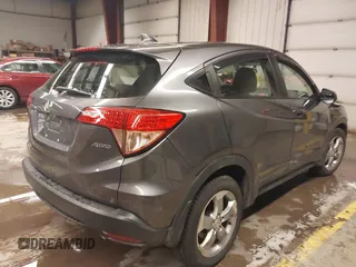 2018 Honda HR-V LX with VIN 3CZRU6H35JM704037, listed as a IAAI auction lot 41574796 with 140,671 mi miles. Bid and sale history available at carsss.com. Image 4.