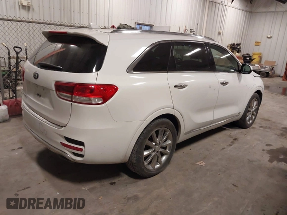 2018 Kia Sorento SX with VIN 5XYPKDA55JG388400, listed as a IAAI auction lot 41332048 with 70,153 mi miles and . Bid and sale history available at DreamBid. Image 4.