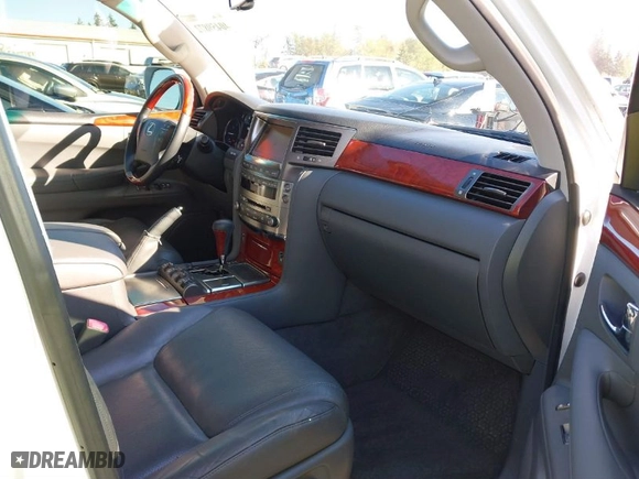 2010 Lexus LX 570 with VIN JTJHY7AX0A4049402, listed as a IAAI auction lot 40459872 with 118,942 mi miles. Bid and sale history available at carsss.com. Image 5.