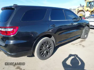 2015 Dodge Durango R/T with VIN 1C4SDHCT5FC937676, listed as a IAAI auction lot 41369508 with 107,075 mi miles and . Bid and sale history available at DreamBid. Image 4.