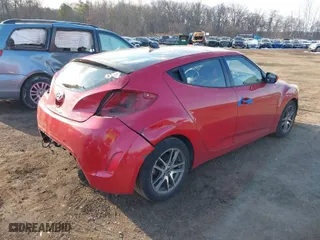 2012 Hyundai Veloster w/Gray Int with VIN KMHTC6AD7CU056647, listed as a IAAI auction lot 41434535 with 68,691 mi miles. Bid and sale history available at carsss.com. Image 4.