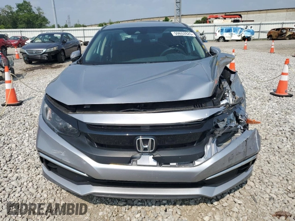 2021 Honda Civic LX with VIN 19XFC2F66ME001627, listed as a Copart auction lot 59653925 with 48,468 mi miles and Salvage title. Bid and sale history available at DreamBid. Image 5.