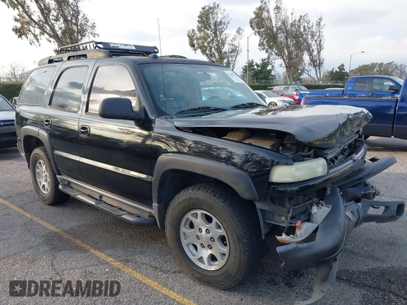 2004 Chevrolet Tahoe LS with VIN 1GNEK13T64R265302, listed as a IAAI auction lot 41445237 with 242,840 mi miles. Bid and sale history available at carsss.com. Image 1.