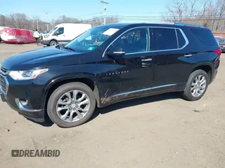 2018 Chevrolet Traverse Premier with VIN 1GNEVJKW8JJ159561, listed as a IAAI auction lot 41774914 with 132,598 mi miles and . Bid and sale history available at DreamBid. Image 2.