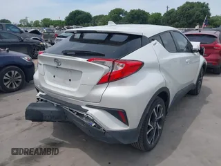 2022 Toyota C-HR XLE z VIN NMTKHMBX2NR144638, wystawiony jako IAAI lot #42063325 z przebiegiem 22 823 mil mil oraz . Historia ofert i sprzedaży dostępna na DreamBid. Obrazek 4.