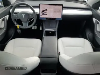 2021 Tesla Model Y Performance with VIN 5YJYGDEF4MF201815, listed as a Copart auction lot 42453075 with 76,888 mi miles and Salvage Title. Bid and sale history available at DreamBid. Image 8.