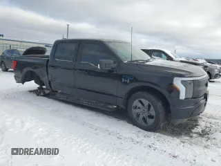 2024 Ford F-150 Lightning Flash with VIN 1FT6W3L76RWG12085, listed as a Copart auction lot 87181614 with 17,444 mi miles and Salvage title. Bid and sale history available at DreamBid. Image 4.