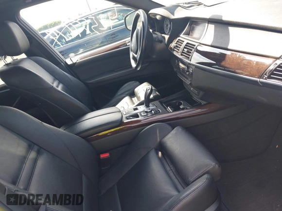 2012 BMW X5 35d with VIN 5UXZW0C56CL664575, listed as a IAAI auction lot 42559674 with 157,554 mi miles and . Bid and sale history available at DreamBid. Image 5.