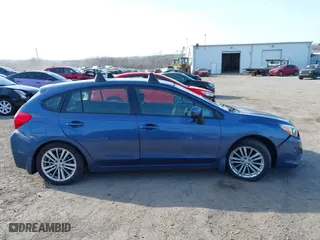 2012 Subaru Impreza Wagon 2.0i Premium with VIN JF1GPAF65CH208057, listed as a IAAI auction lot 41774058 with 93,335 mi miles. Bid and sale history available at carsss.com. Image 13.