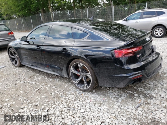 2023 Audi RS 5 Sportback z VIN WUAAWCF5XPA900600, wystawiony jako Copart lot #58295863 z przebiegiem 4808 mil mil oraz . Historia ofert i sprzedaży dostępna na DreamBid. Obrazek 2.