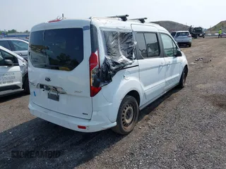 2014 Ford Transit Connect XLT with VIN NM0GE9F79E1151295, listed as a IAAI auction lot 42477637 with 289,691 mi miles and . Bid and sale history available at DreamBid. Image 4.