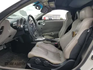 2006 Nissan 350Z Touring z VIN JN1AZ36A86M456456, wystawiony jako Copart lot #59199645 z przebiegiem 109 682 mil mil oraz Szkoda całkowita • Salvage title. Historia ofert i sprzedaży dostępna na DreamBid. Obrazek 7.