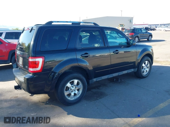2011 Ford Escape Limited with VIN 1FMCU9EGXBKB66282, listed as a IAAI auction lot 42177063 with 244,515 mi miles. Bid and sale history available at carsss.com. Image 4.