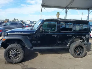 2021 Jeep Wrangler Unlimited Sport S with VIN 1C4HJXDN3MW681403, listed as a IAAI auction lot 41616298 with 40,526 mi miles and . Bid and sale history available at DreamBid. Image 13.