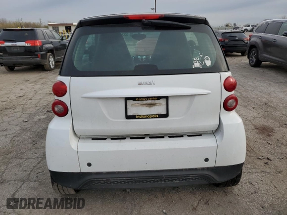 2014 Smart fortwo Pure z VIN WMEEJ3BA0EK757231, wystawiony jako Copart lot #52346105 z przebiegiem 142 976 mil mil oraz Czysty tytuł • Clean title. Historia ofert i sprzedaży dostępna na DreamBid. Obrazek 6.