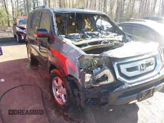 2009 Honda Pilot EX-L with VIN 5FNYF48699B023311, listed as a IAAI auction lot 41981928 with Not Provided miles and . Bid and sale history available at carsss.com. Image 6.