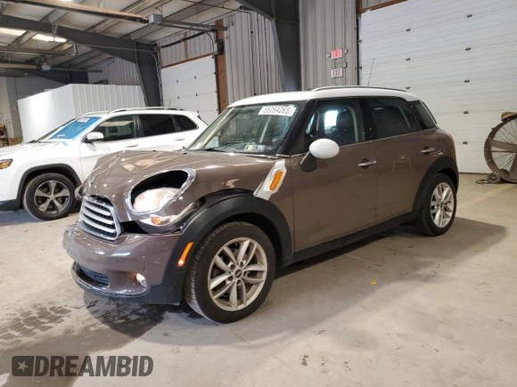 2012 MINI Countryman with VIN WMWZB3C52CWM01672, listed as a Copart auction lot 56064265 with 97,267 mi miles and Salvage Title. Bid and sale history available at DreamBid. Image 1.